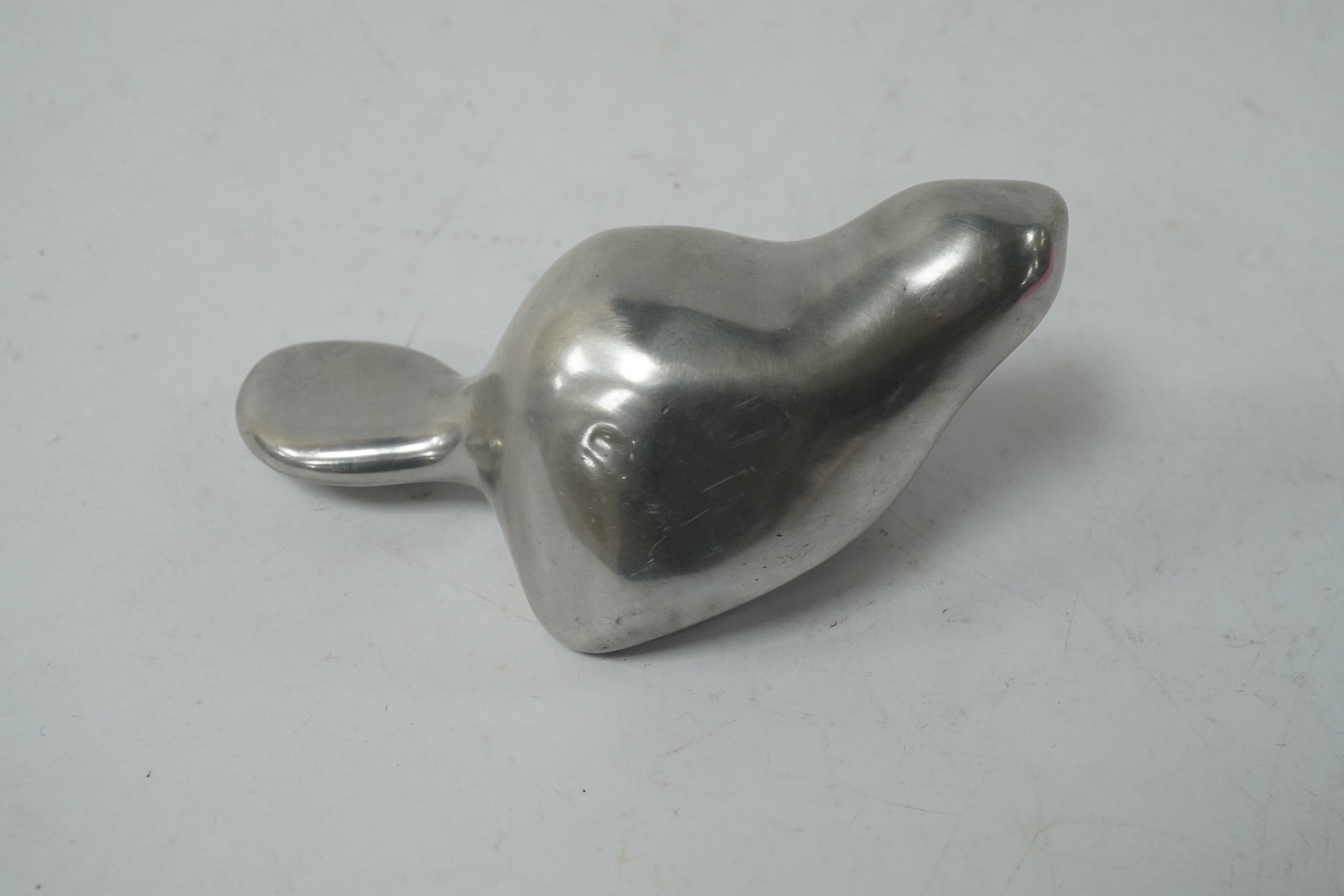 A modernist John Hoselton beaver, signed and numbered 954, 14cm wide. Condition - fair